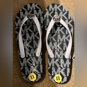 Michael Kors Flip Flops size 11 brand new